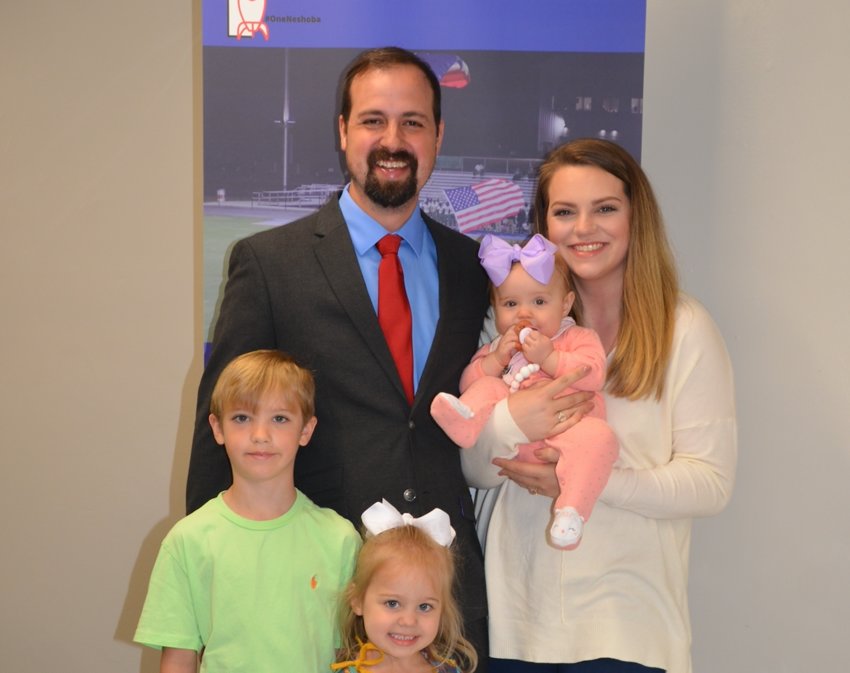 Jacob Drury was named the new Neshoba Central Middle School principal Tuesday morning. He introduced his wife, Courtney, and three children, Reiney, Aiden and Kinsley, to the School Board. Not pictured is daughter, Ashtyn.